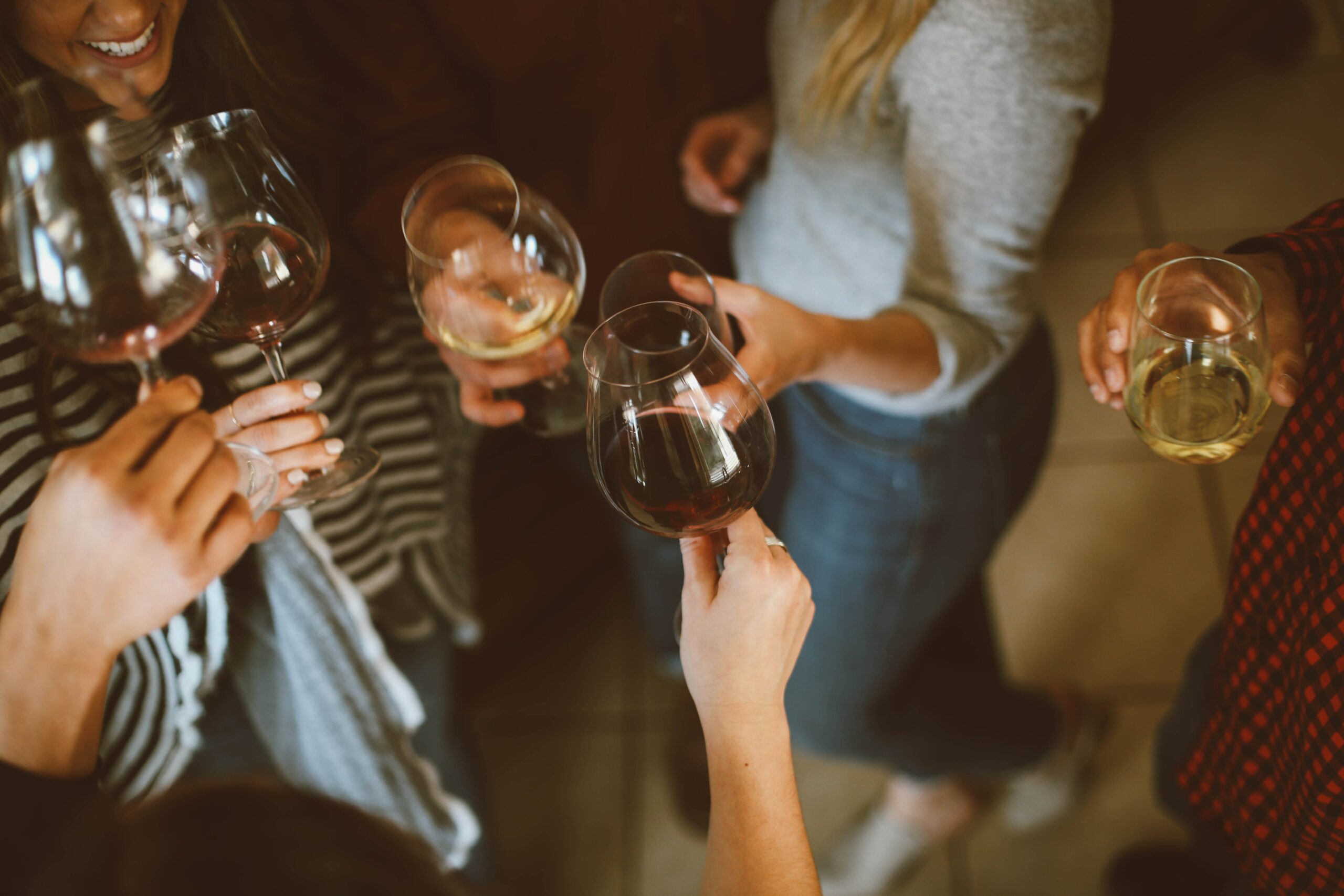 group of ladies drinking white wine