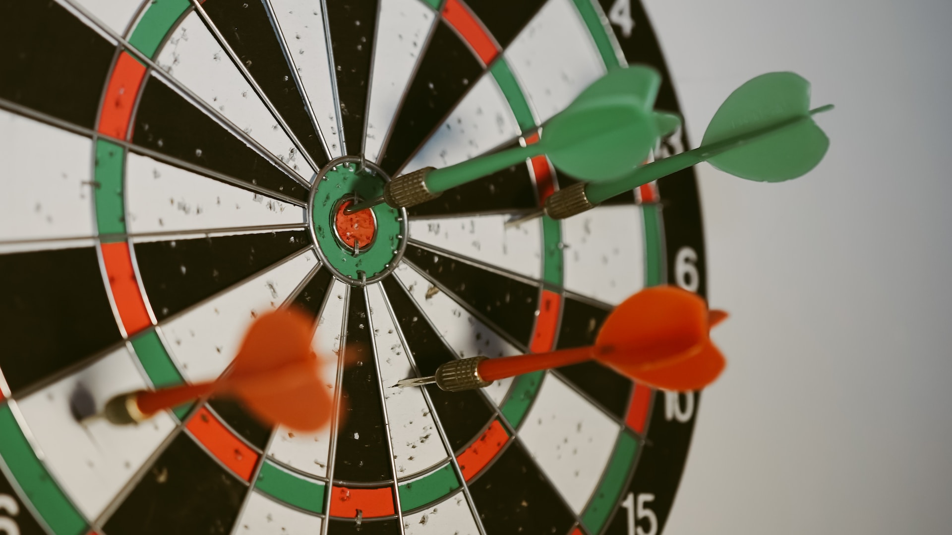 dart board with 4 darts